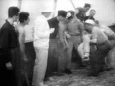 Parker is brought aboard the freighter