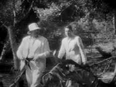 Moreau and Parker waling through the jungle